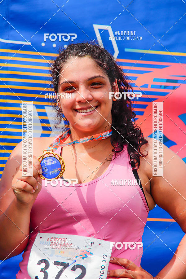 Buy your photos of the event4 Corrida Solidria - 6K Corrida e 4K Caminhada on Fotop