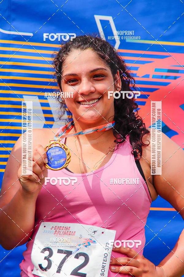 Buy your photos of the event4 Corrida Solidria - 6K Corrida e 4K Caminhada on Fotop