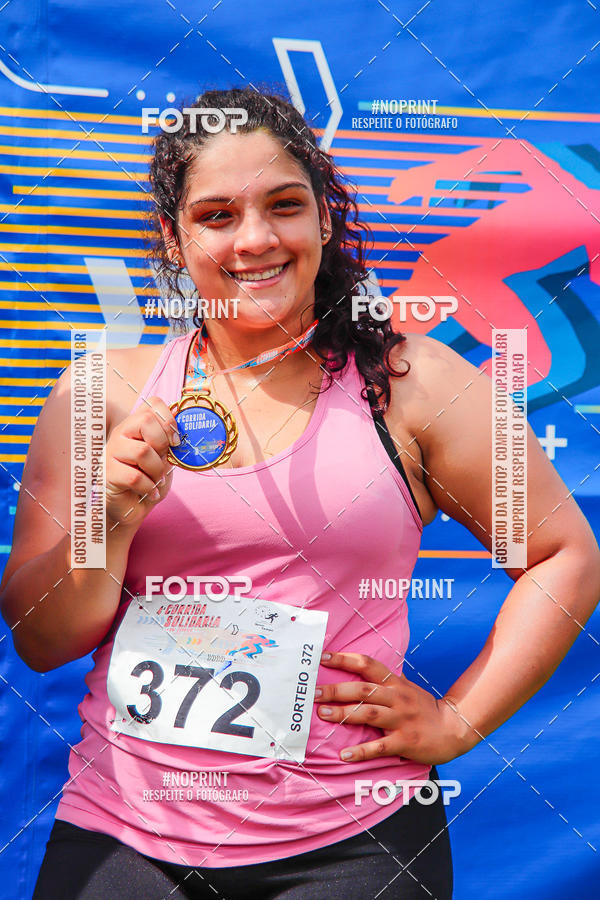 Buy your photos of the event4 Corrida Solidria - 6K Corrida e 4K Caminhada on Fotop