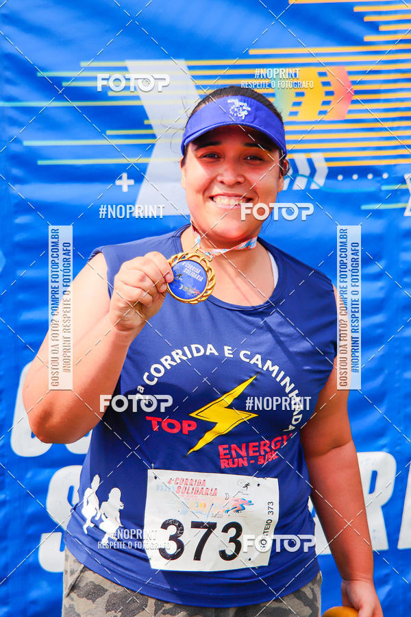 Buy your photos of the event4 Corrida Solidria - 6K Corrida e 4K Caminhada on Fotop