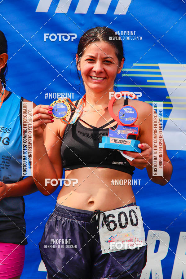Buy your photos of the event4 Corrida Solidria - 6K Corrida e 4K Caminhada on Fotop