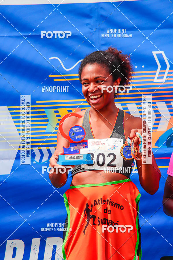 Buy your photos of the event4 Corrida Solidria - 6K Corrida e 4K Caminhada on Fotop