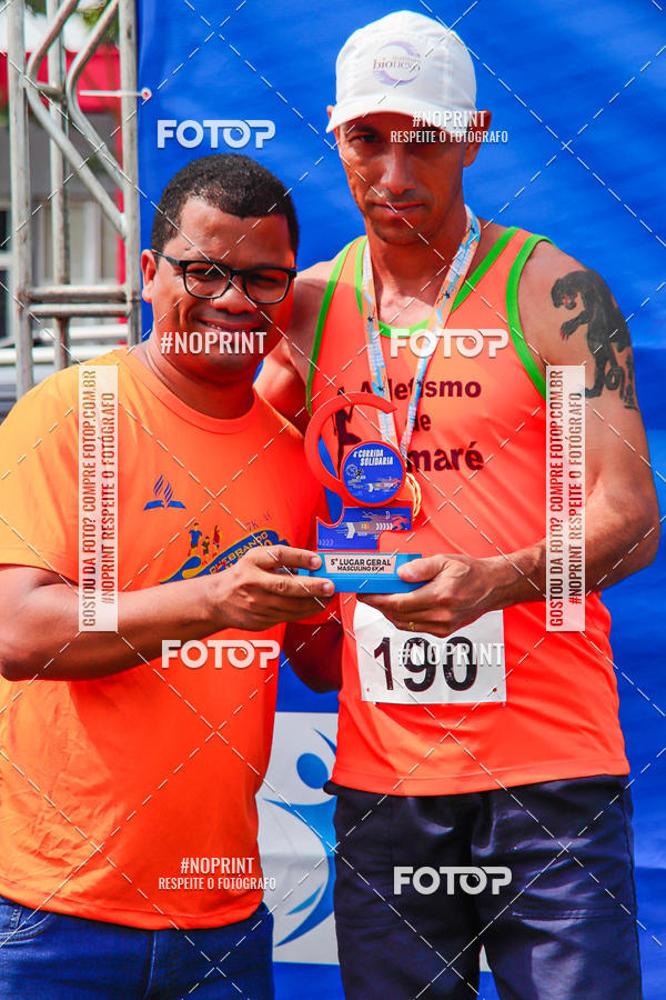 Buy your photos of the event4 Corrida Solidria - 6K Corrida e 4K Caminhada on Fotop