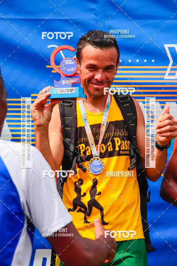 Buy your photos of the event4 Corrida Solidria - 6K Corrida e 4K Caminhada on Fotop