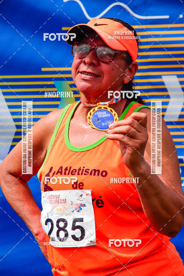 Buy your photos of the event4 Corrida Solidria - 6K Corrida e 4K Caminhada on Fotop