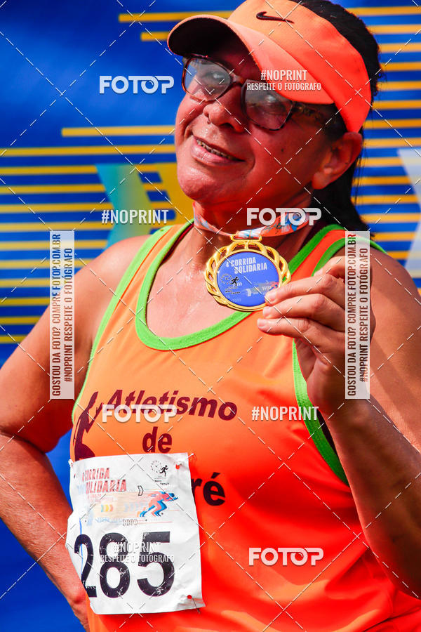 Buy your photos of the event4 Corrida Solidria - 6K Corrida e 4K Caminhada on Fotop