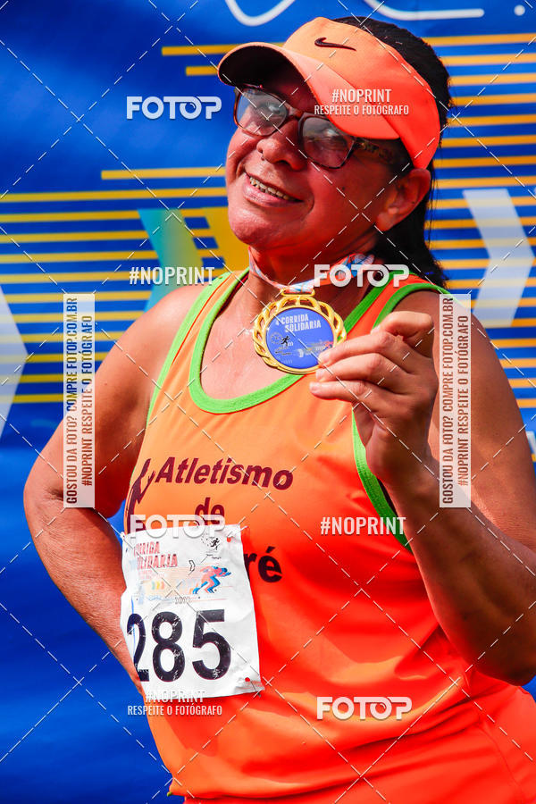 Buy your photos of the event4 Corrida Solidria - 6K Corrida e 4K Caminhada on Fotop