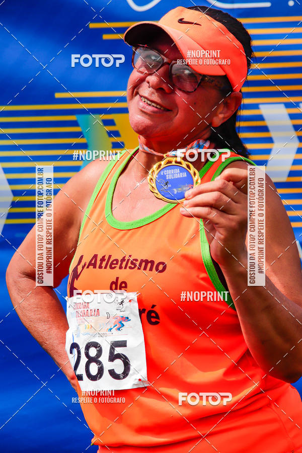 Buy your photos of the event4 Corrida Solidria - 6K Corrida e 4K Caminhada on Fotop
