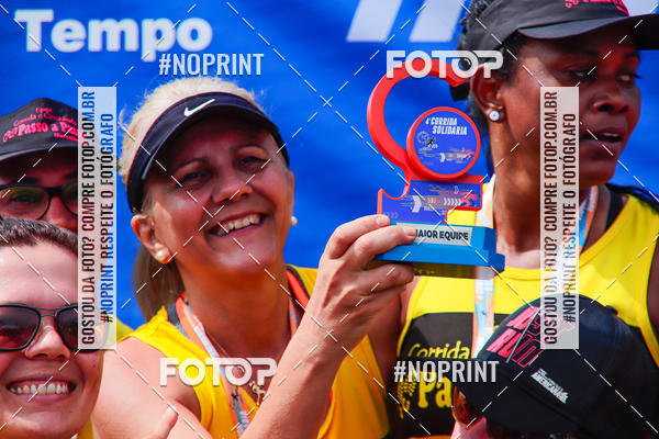 Buy your photos of the event4 Corrida Solidria - 6K Corrida e 4K Caminhada on Fotop