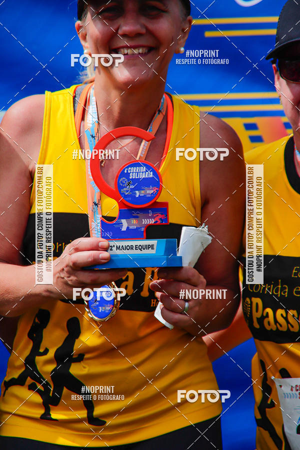 Buy your photos of the event4 Corrida Solidria - 6K Corrida e 4K Caminhada on Fotop