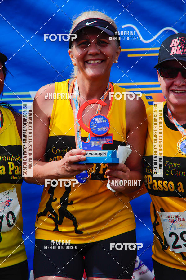 Buy your photos of the event4 Corrida Solidria - 6K Corrida e 4K Caminhada on Fotop