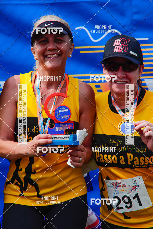 Buy your photos of the event4 Corrida Solidria - 6K Corrida e 4K Caminhada on Fotop