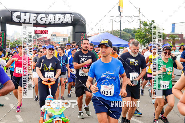 Buy your photos of the event4 Corrida Solidria - 6K Corrida e 4K Caminhada on Fotop