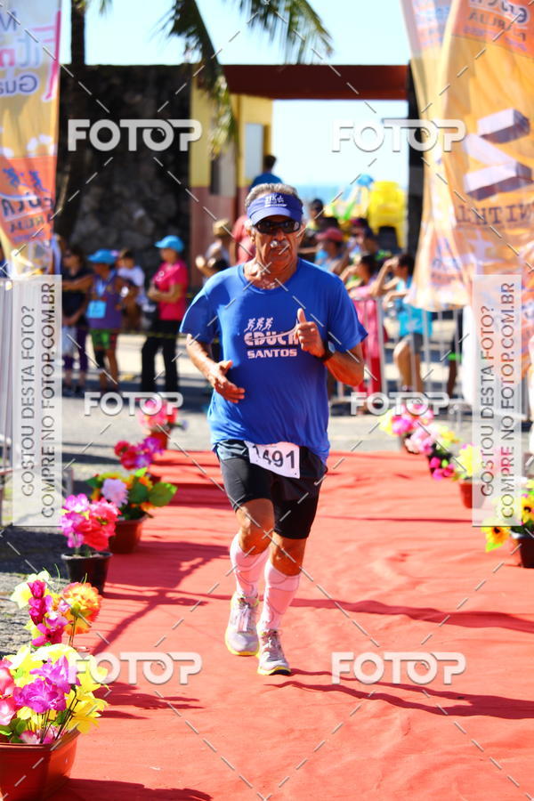 Buy your photos of the eventCircuito Guaruj 10k - 3 Etapa - Desafio do Drago on Fotop