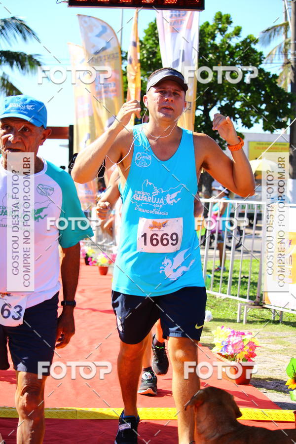 Buy your photos of the eventCircuito Guaruj 10k - 3 Etapa - Desafio do Drago on Fotop