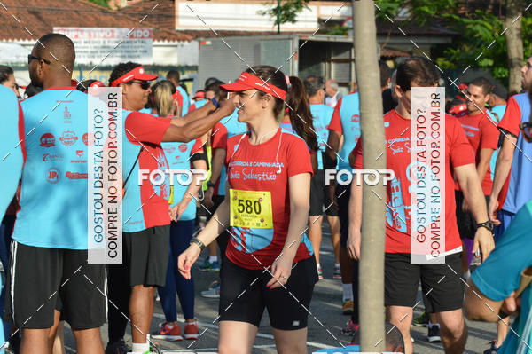 Buy your photos of the eventIII Corrida e Caminhada da Parquia de So Sebastio on Fotop