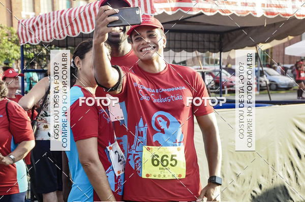 Buy your photos of the eventIII Corrida e Caminhada da Parquia de So Sebastio on Fotop