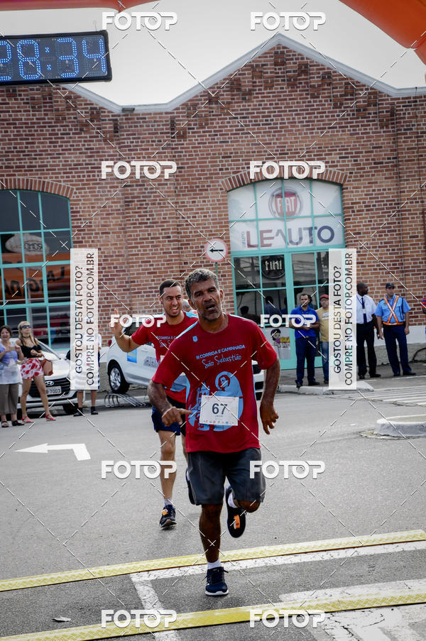 Buy your photos of the eventIII Corrida e Caminhada da Parquia de So Sebastio on Fotop