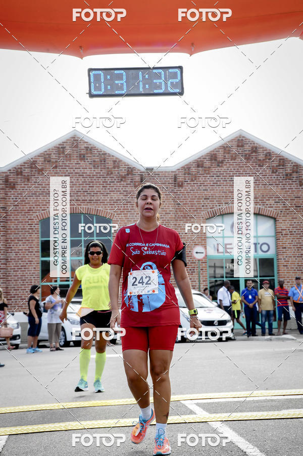Buy your photos of the eventIII Corrida e Caminhada da Parquia de So Sebastio on Fotop