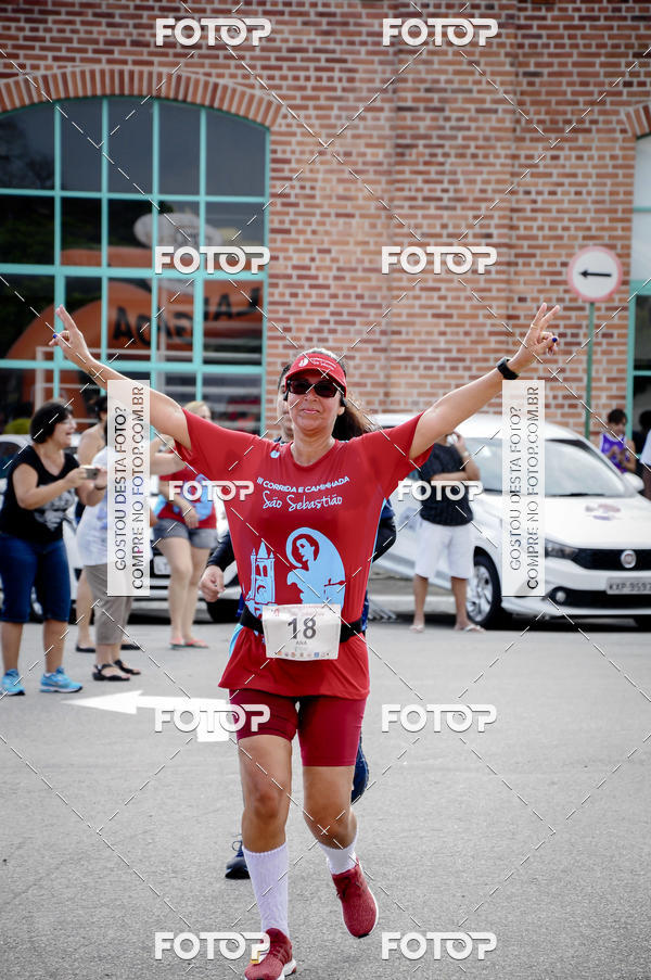 Buy your photos of the eventIII Corrida e Caminhada da Parquia de So Sebastio on Fotop