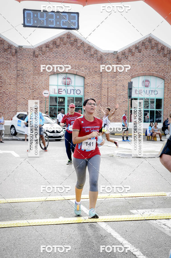 Buy your photos of the eventIII Corrida e Caminhada da Parquia de So Sebastio on Fotop