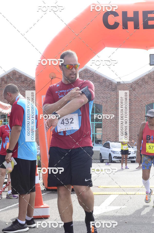 Buy your photos of the eventIII Corrida e Caminhada da Parquia de So Sebastio on Fotop