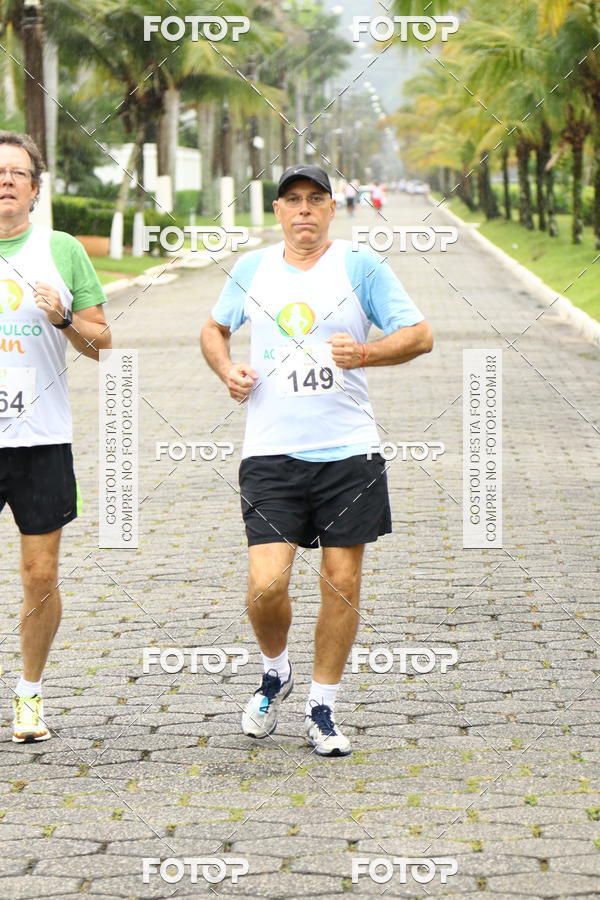 Buy your photos of the eventCorrida e Caminhada 6K Acapulco Run  on Fotop