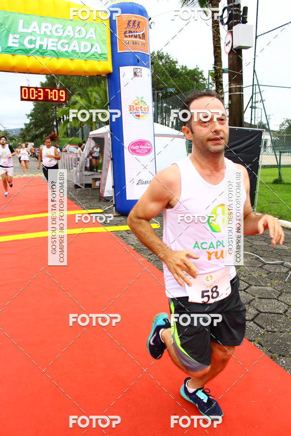 Buy your photos of the eventCorrida e Caminhada 6K Acapulco Run  on Fotop