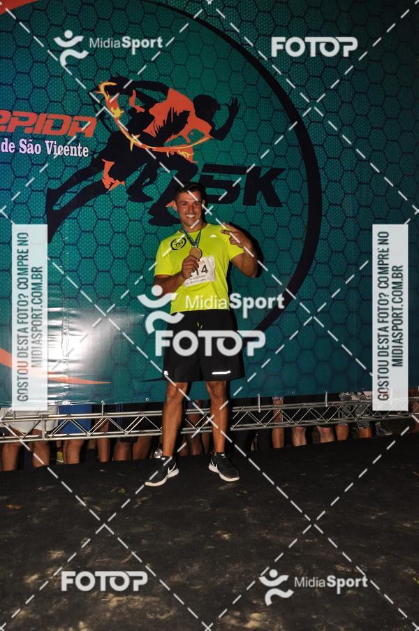 Compra tus fotos del eventoCorrida Noturna 5k Aniversario de So Vicente En Fotop