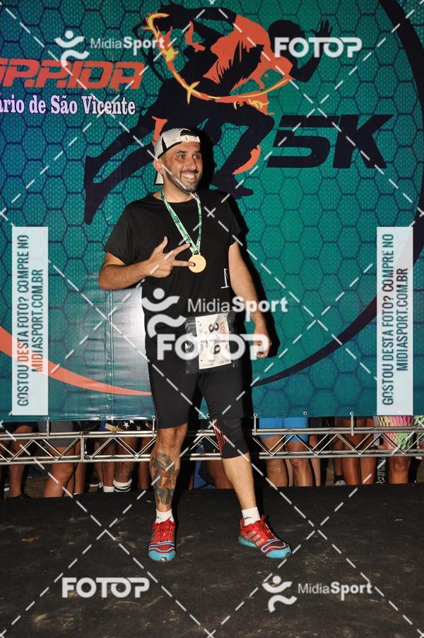 Compra tus fotos del eventoCorrida Noturna 5k Aniversario de So Vicente En Fotop