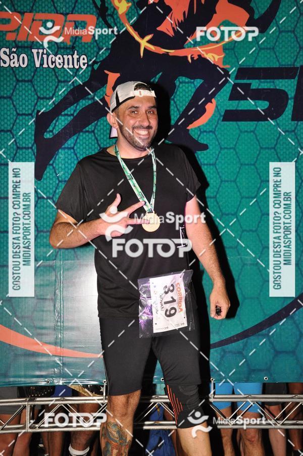 Compre as suas fotos do eventoCorrida Noturna 5k Aniversario de So Vicente no Fotop