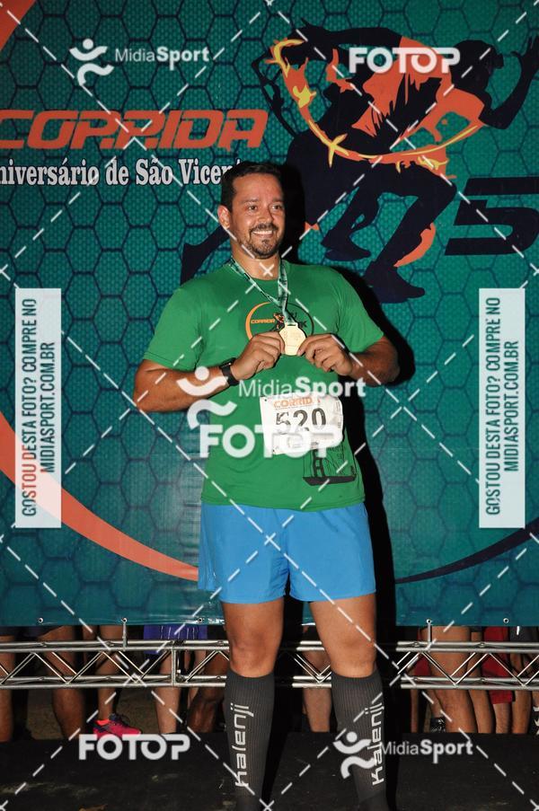 Compre as suas fotos do eventoCorrida Noturna 5k Aniversario de So Vicente no Fotop