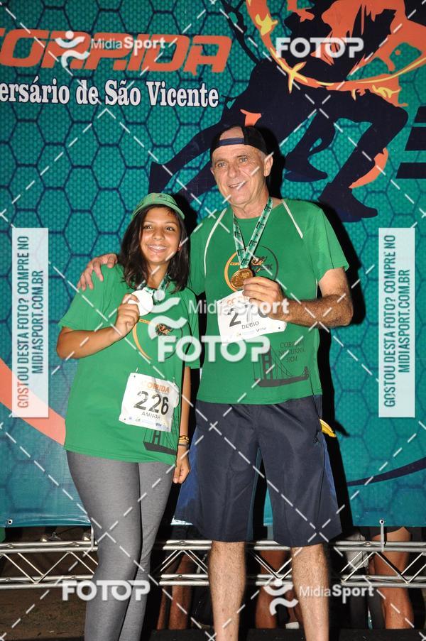 Compra tus fotos del eventoCorrida Noturna 5k Aniversario de So Vicente En Fotop