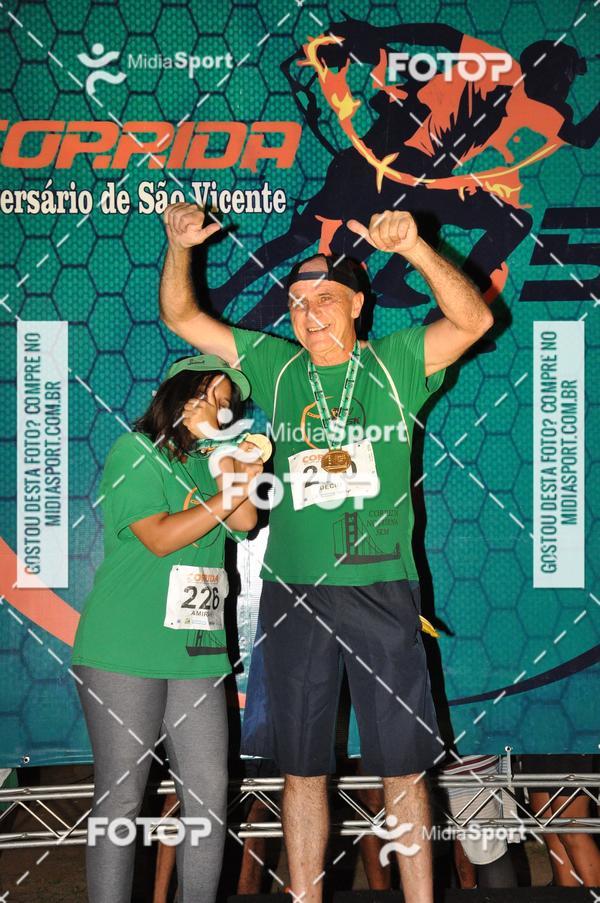 Compra tus fotos del eventoCorrida Noturna 5k Aniversario de So Vicente En Fotop