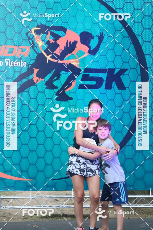 Buy your photos of the eventCorrida Noturna 5k Aniversario de So Vicente on Fotop