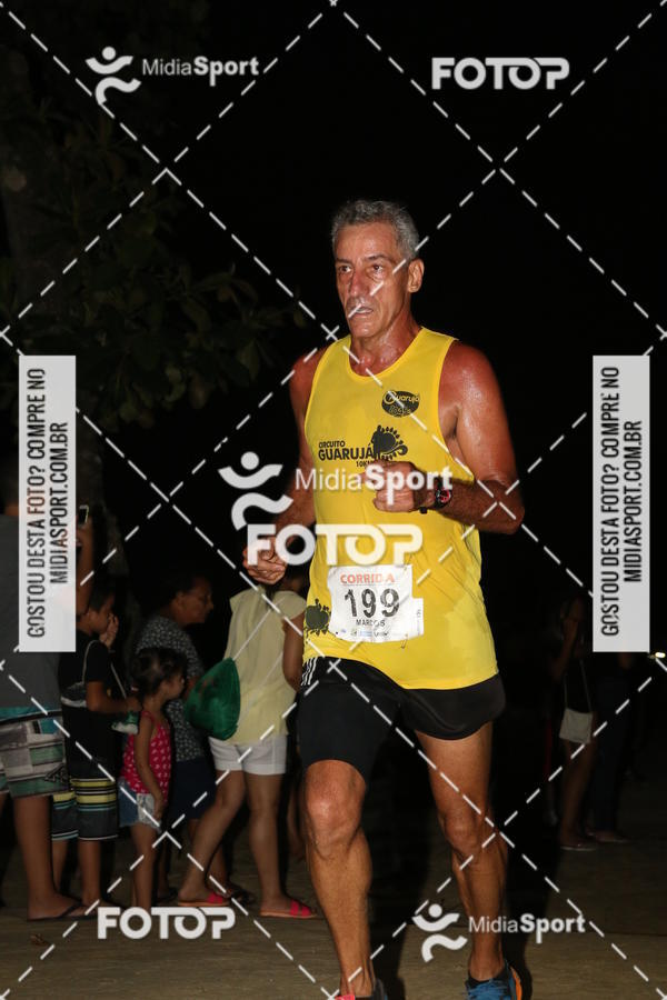 Buy your photos of the eventCorrida Noturna 5k Aniversario de So Vicente on Fotop