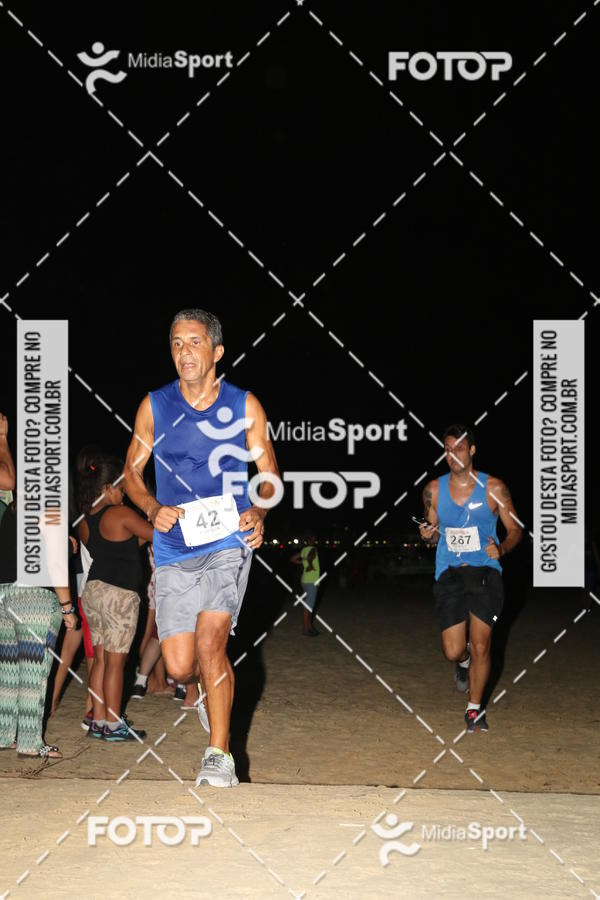 Buy your photos of the eventCorrida Noturna 5k Aniversario de So Vicente on Fotop