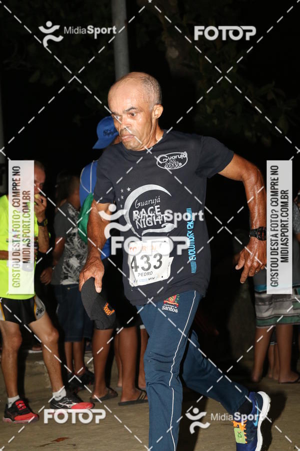 Buy your photos of the eventCorrida Noturna 5k Aniversario de So Vicente on Fotop