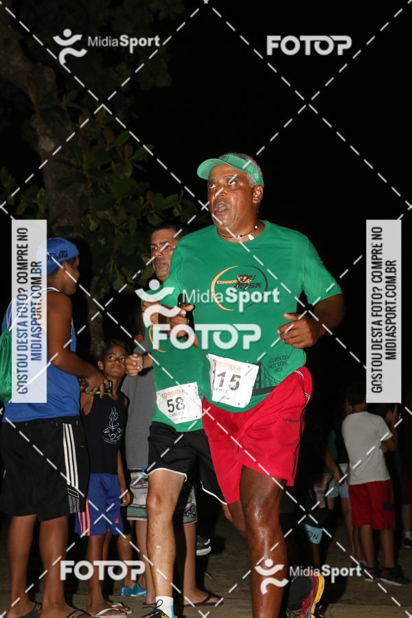 Buy your photos of the eventCorrida Noturna 5k Aniversario de So Vicente on Fotop