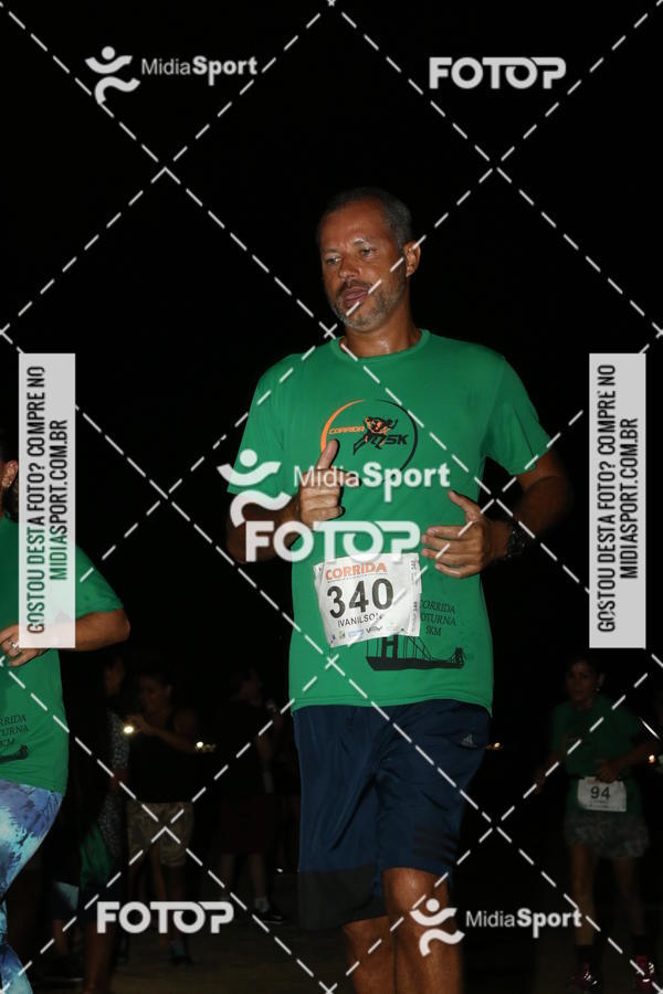 Buy your photos of the eventCorrida Noturna 5k Aniversario de So Vicente on Fotop