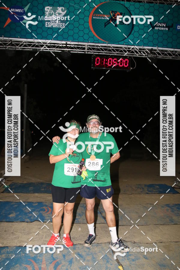 Compra tus fotos del eventoCorrida Noturna 5k Aniversario de So Vicente En Fotop