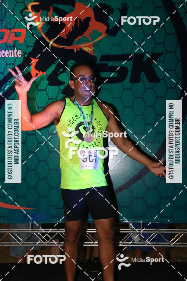 Compre as suas fotos do eventoCorrida Noturna 5k Aniversario de So Vicente no Fotop