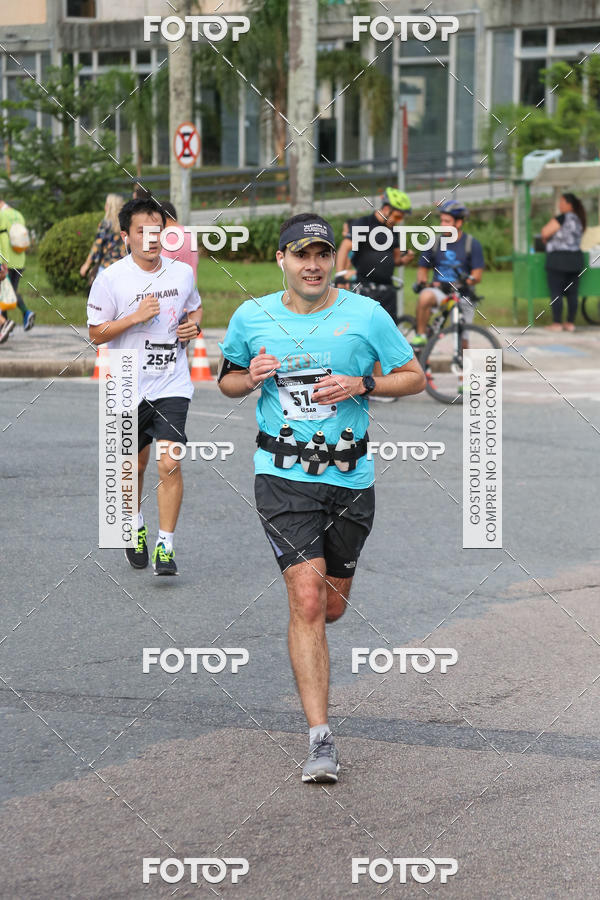 Buy your photos of the eventMeia Maratona Internacional de Curitiba 2018 on Fotop