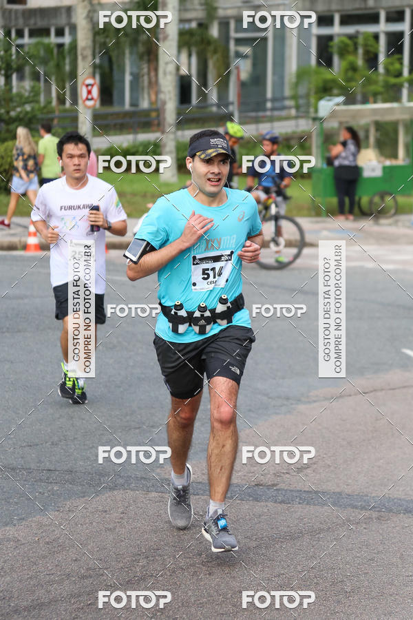 Buy your photos of the eventMeia Maratona Internacional de Curitiba 2018 on Fotop