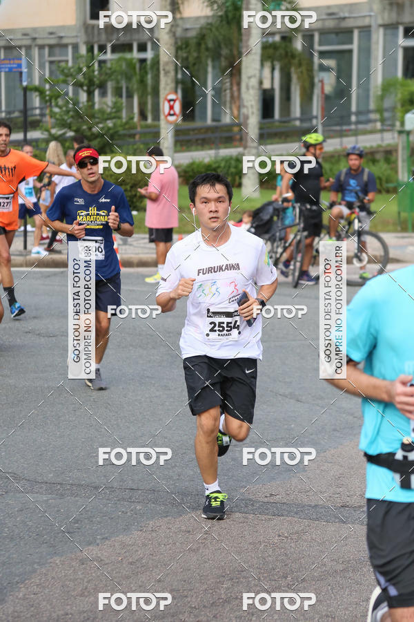 Buy your photos of the eventMeia Maratona Internacional de Curitiba 2018 on Fotop