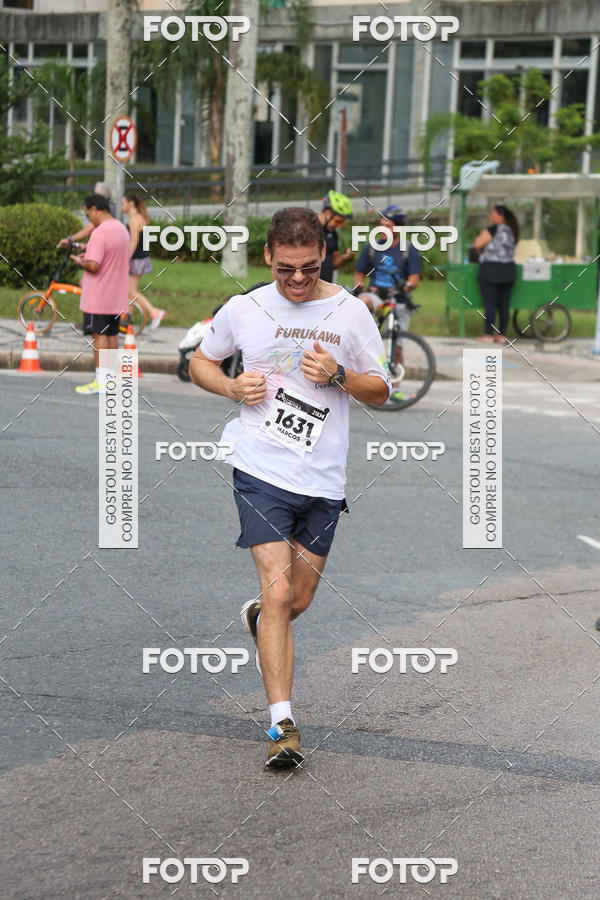 Buy your photos of the eventMeia Maratona Internacional de Curitiba 2018 on Fotop