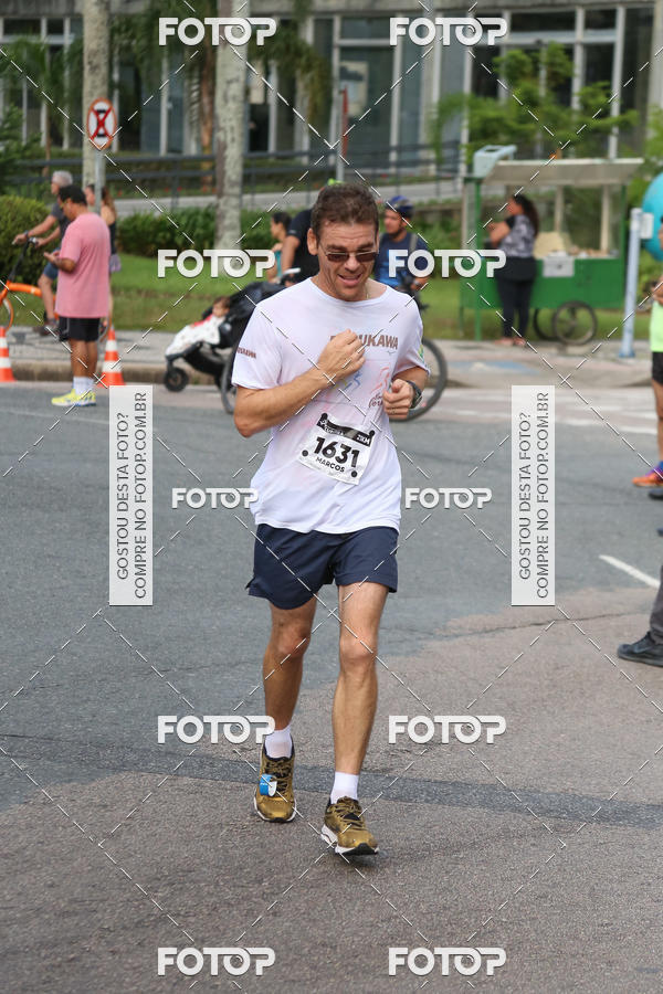 Buy your photos of the eventMeia Maratona Internacional de Curitiba 2018 on Fotop