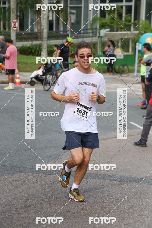 Buy your photos of the eventMeia Maratona Internacional de Curitiba 2018 on Fotop