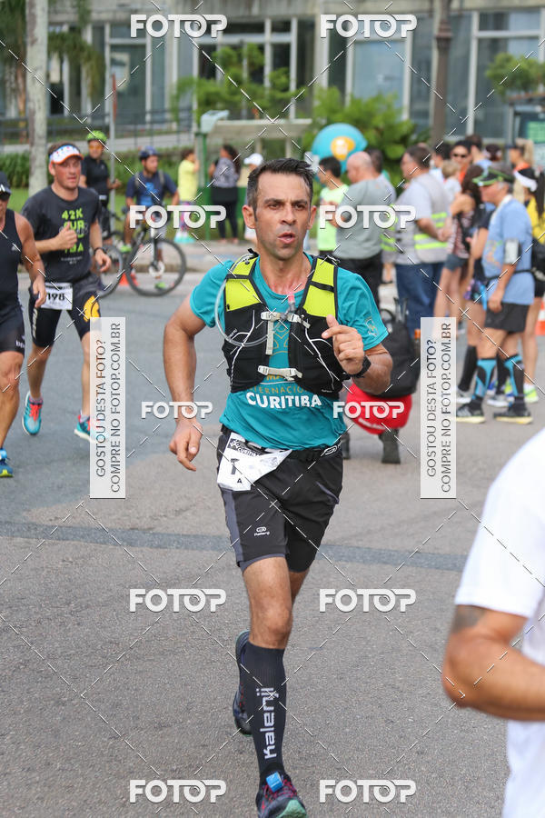 Buy your photos of the eventMeia Maratona Internacional de Curitiba 2018 on Fotop