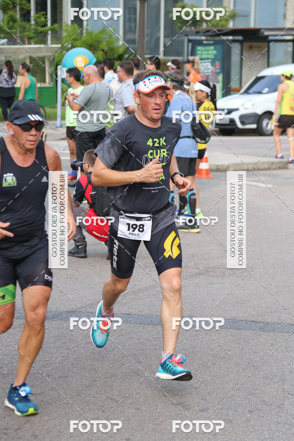 Buy your photos of the eventMeia Maratona Internacional de Curitiba 2018 on Fotop